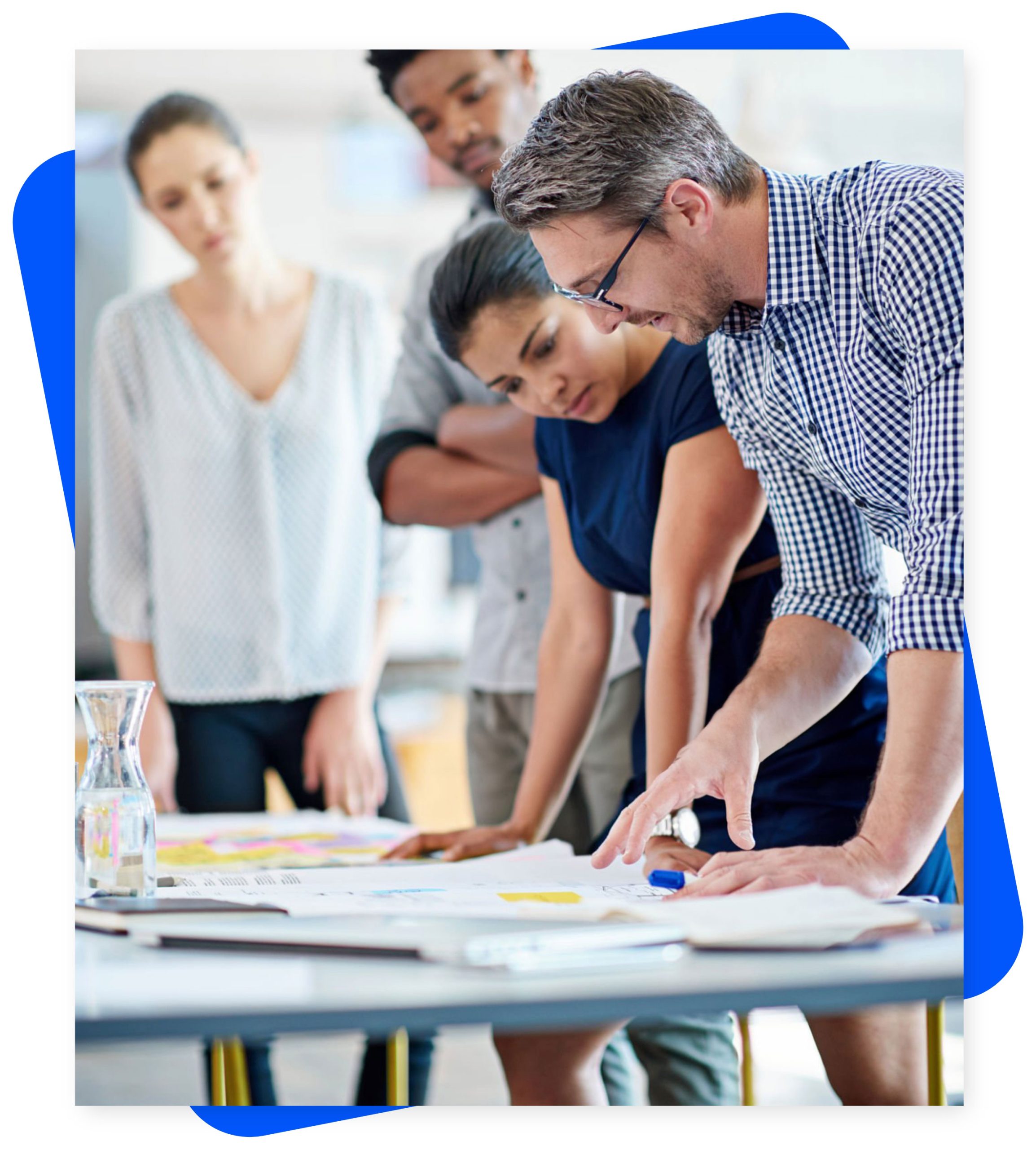 Business consultant team reviewing project documents