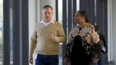 Two business people talking for JB Hunt Insight